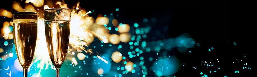 Champagne Glasses Infront Of Fireworks – New Year